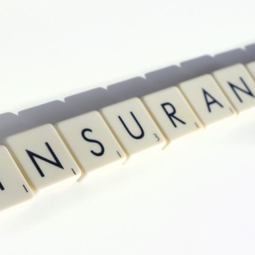scrabble tiles spelling out insurance