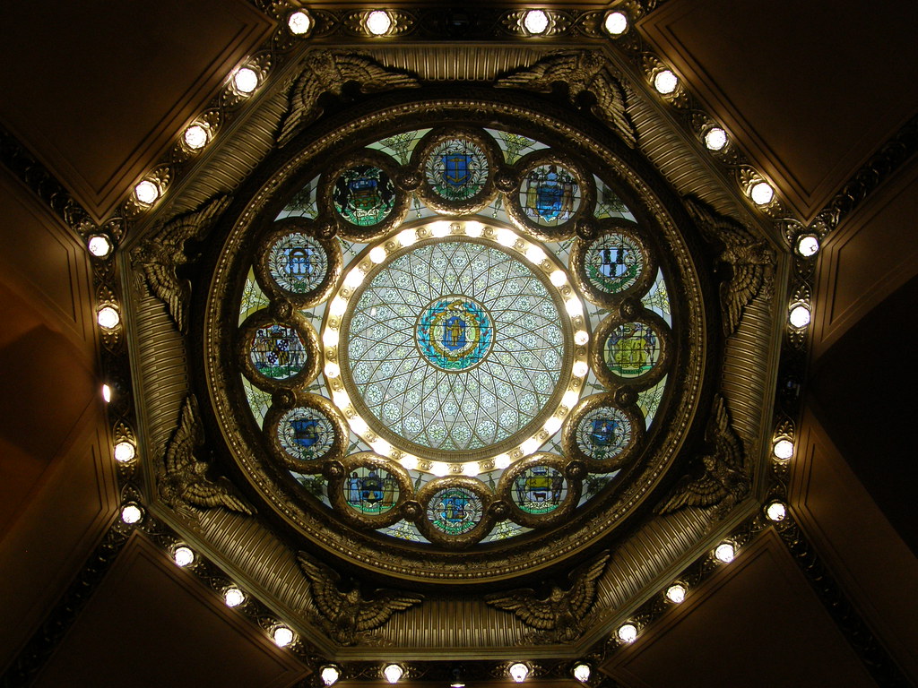 stained glass medallions surrounded by lights