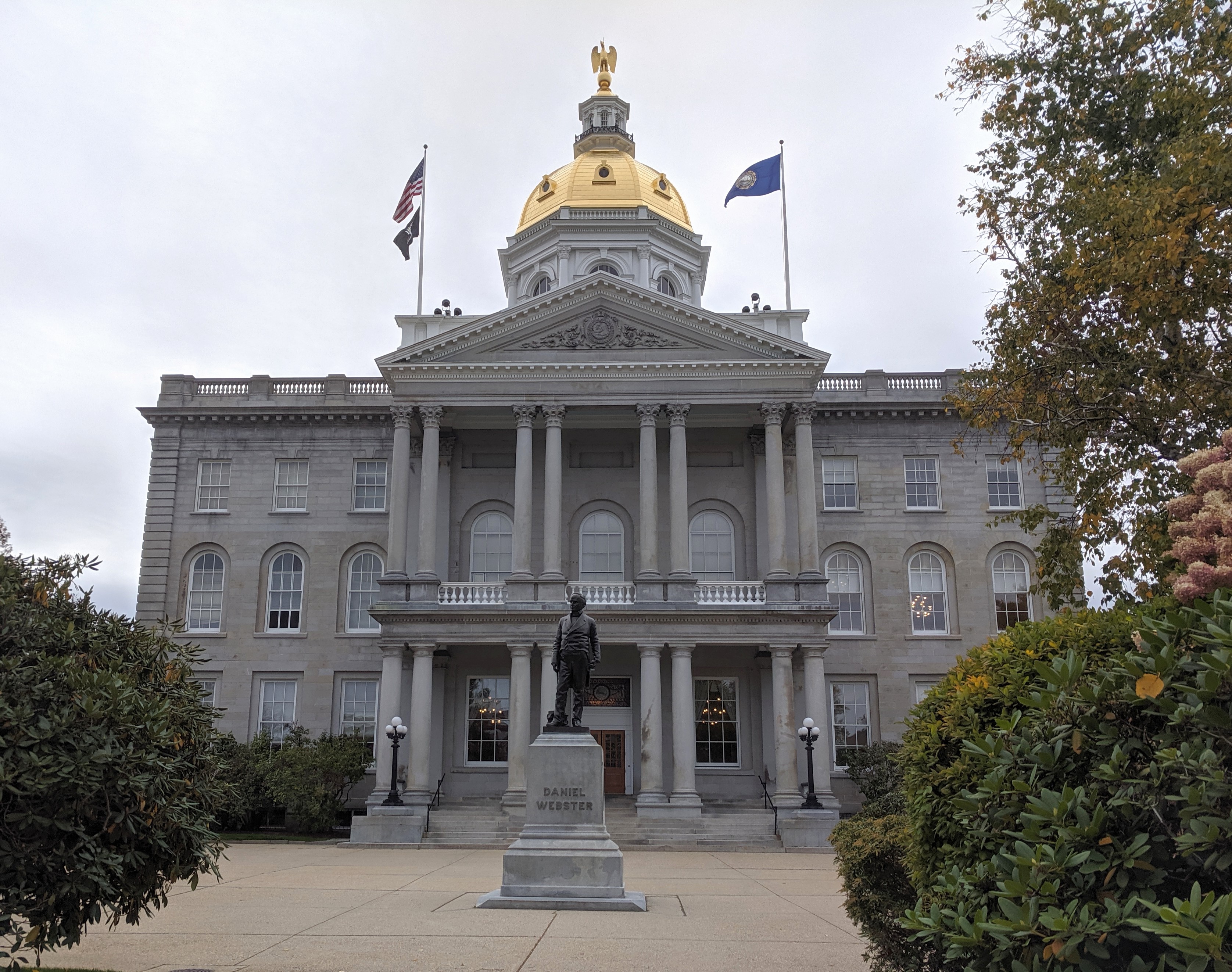 Granite state house building with gold dome