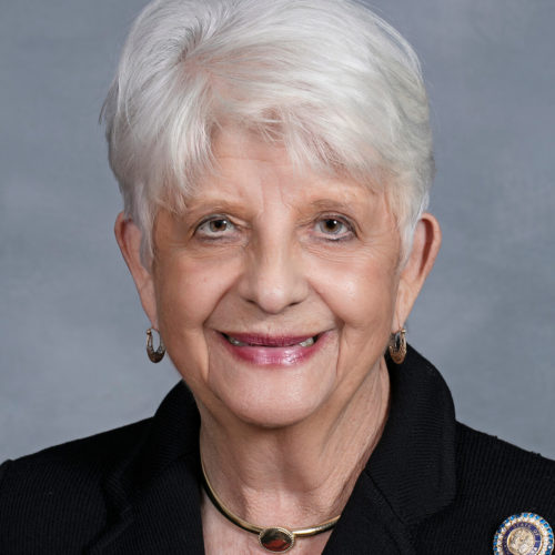 headshot of Rep. Howard (woman with white hair and black suit)